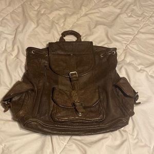 Genuine leather shell 100 % cotton linings backpack